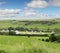 Caravan trailer camping in English green fields