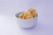 carbohydrate food, 2 white bread in white bowl served on plain background