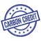 CARBON CREDIT text written on blue vintage round stamp