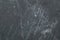 Carbon stone gray texture. scratched surface. geological background