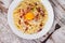 Carbonara pasta with raw egg, bacon and parmesan cheese