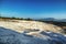 Carbonate travertines the natural pools during sunset, Pamukkale, Turkey