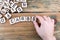 Carbs. Wooden letters on the office desk, informative and communication background