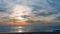 Carcavelos beach filled with many surfers at Sunset, Lisbon, Portugal