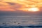 Carcavelos beach filled with many surfers at Sunset, Lisbon, Portugal