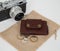 Card holder wallet in brown with coins