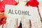 Card with the text alcohol. stop alcoholism concept