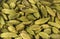 Cardamon seeds background. Natural seasoning texture. Natural spices and food ingredients