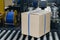 cardboard box of product packaging is moving on conveyor belt of automatic packing machine in the manufacturing factory ready for