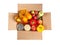 Cardboard box with a set of food on a white isolated background. Fruits, vegetables, canned food, vegetable oil, spaghetti. Food