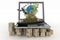 Cardboard boxes around globe on laptop screen, cargo ship and plane