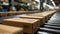 Cardboard boxes on a conveyor belt in a warehouse illustrate streamlined logistics and shipping processes