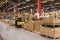 Cardboard boxes in industrial factory shipping storage area