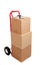 Cardboard boxes on a red hand truck