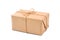 Cardboard carton wrapped with brown paper and cord