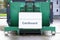 Cardboard recycle green bin macerator container at recycling plant business