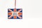 Cardboard tag on a string with a flag and the inscription made in great Britain