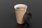 Cardboard take away coffee paper cup mock up with opened black lid on black background