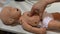 Cardiac massage on baby mannequin