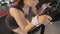 Cardio workout, plump woman riding stationary bike and sweating, sport