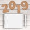 Cardstock Numbers 2019 Happy New Year Sign near White Spiral Pap