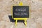 Career building symbol. Concept words Career building on beautiful black chalk blackboard. Beautiful sea stone beach background.