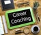 Career Coaching - Text on Small Chalkboard. 3D.