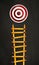 Career ladder made of yellow pencils with target with black chalkboard background