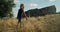 Carefree child boy climb the hill on summertime mountain journey on countryside