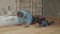 Carefree dad and son exercising push-ups at home