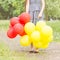 Carefree , Freedom Woman with Red and Yellow Balloons