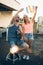 Carefree group of friends enjoying party on rooftop