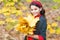 Carefree and happy. happy kid enjoy weather. small girl in autumn leaves. fall time. child with long hair in fall forest