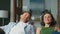 Carefree spouses faces laughing sitting sofa closeup. Excited people having fun