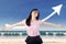 Carefree woman celebrating her success at beach