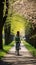 Carefree woman enjoys a bike ride through a lush green park embracing spring vitality