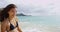 Carefree Young Woman Playing With Windswept Hair At Waikiki Beach