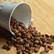 Carefully selected and roasted fresh coffee beans inside the cup