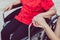 Caregiver hand holding to asian elderly woman sitting on wheelchair,Senior insurance concept