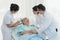 Caregiver and nursing home concept. Asian doctor and nurse in caregiver team checking up elderly / senior patient in nursing home