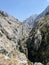 Cares Trail trekking path under blue sky in Spain.