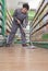 Caretaker Cleaning Floor in Supermarket