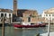 Cargo boat for trade in the canals of the city of Venice.