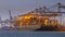 Cargo carrier ship at sunset