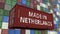 Cargo container with MADE IN NETHERLANDS caption. Dutch import or export related 3D rendering