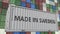 Cargo container with MADE IN SWEDEN caption. Swedish import or export related 3D rendering