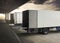 Cargo Container Truck Parked Loading at Dock Warehouse. Cargo Shipment. Industry Freight Truck Transportation. Shipping Warehouse.