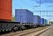 Cargo Containers Transportation On Freight Train By Railway. Intermodal Container On Train Car. Rail Freight Shipping Logistics