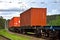 Cargo Containers Transportation On Freight Train By Railway. Intermodal Container On Train Car. Rail Freight Shipping Logistics