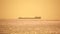 Cargo and dredging industrial ships sailing in to sea horizon. One large cargo ship grain carrier tanker in sea on sunny
